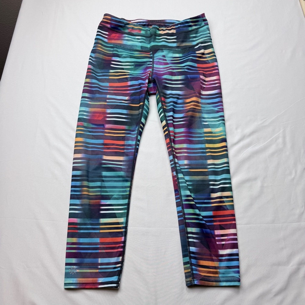Athleta Laser Beam Sonar Capri leggings featuring a multicolor stripe pattern